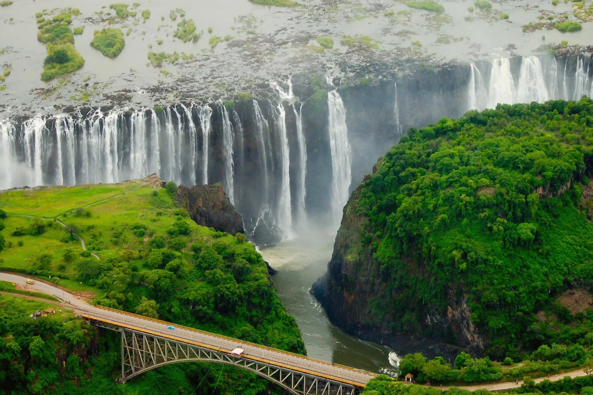 Victoria Falls and the Victoria Falls Bridge, between Zambia and Zimbabwe