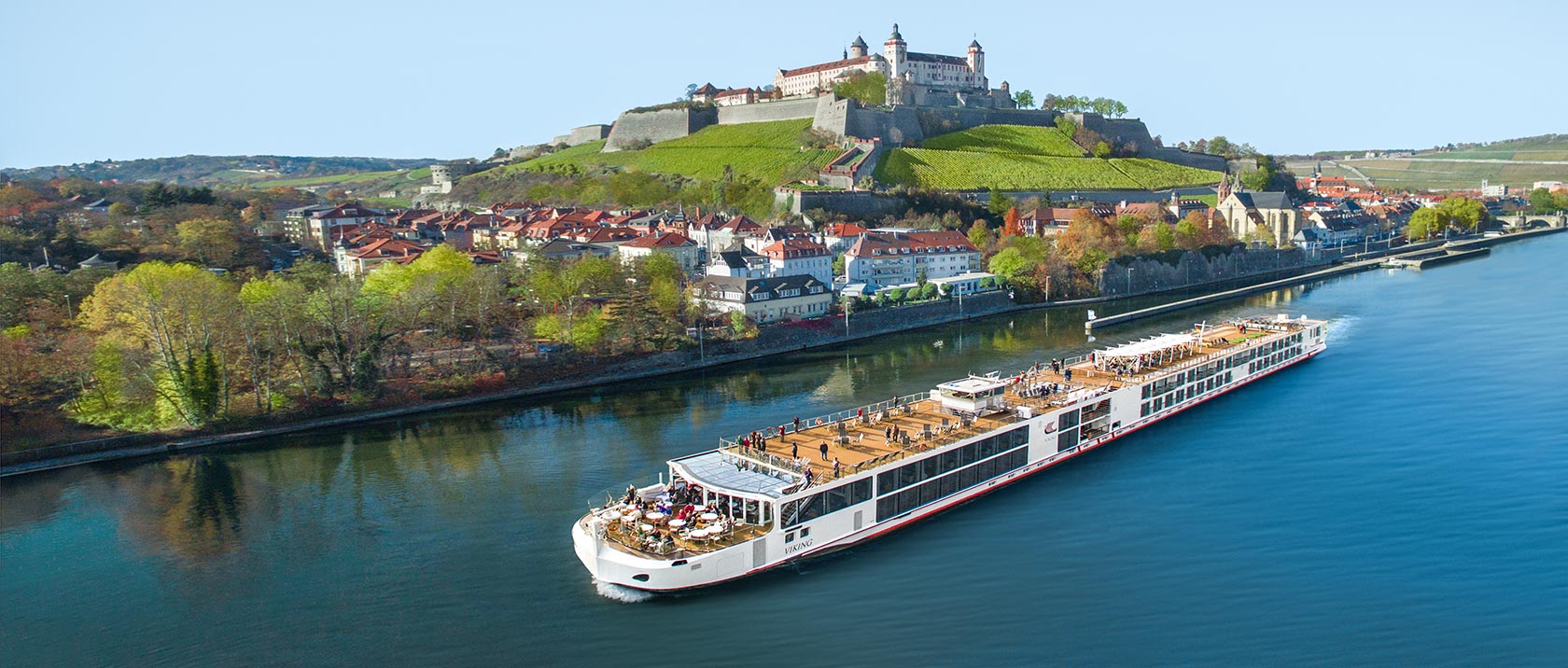 Viking longship on the Main River below Marienberg Fortress in Würzburg, Germany