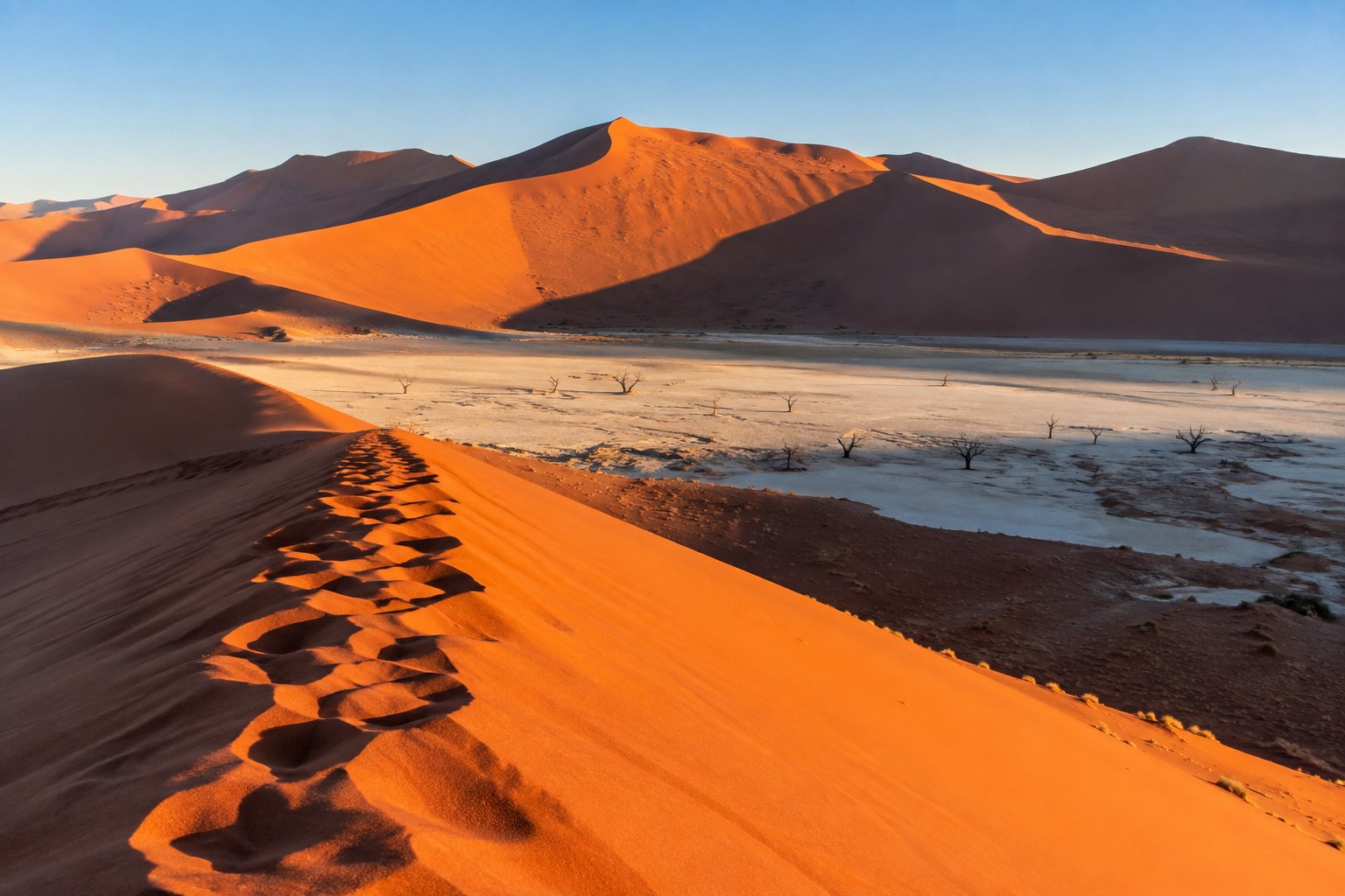 Red sand dunes and the salt pan at Sossusvlei, Namibia