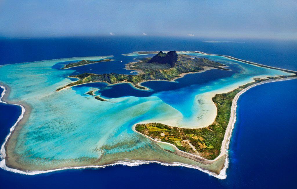 Aerial view of Bora Bora, French Polynesia, with Mount Otemanu above its turquoise lagoon and reef