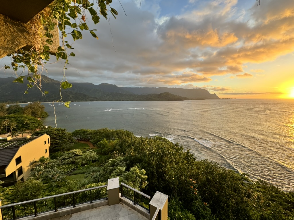 Sunset over Hanalei Bay on Kauai's North Shore, seen from Susan Green's balcony at the 1 Hotel Hanalei Bay