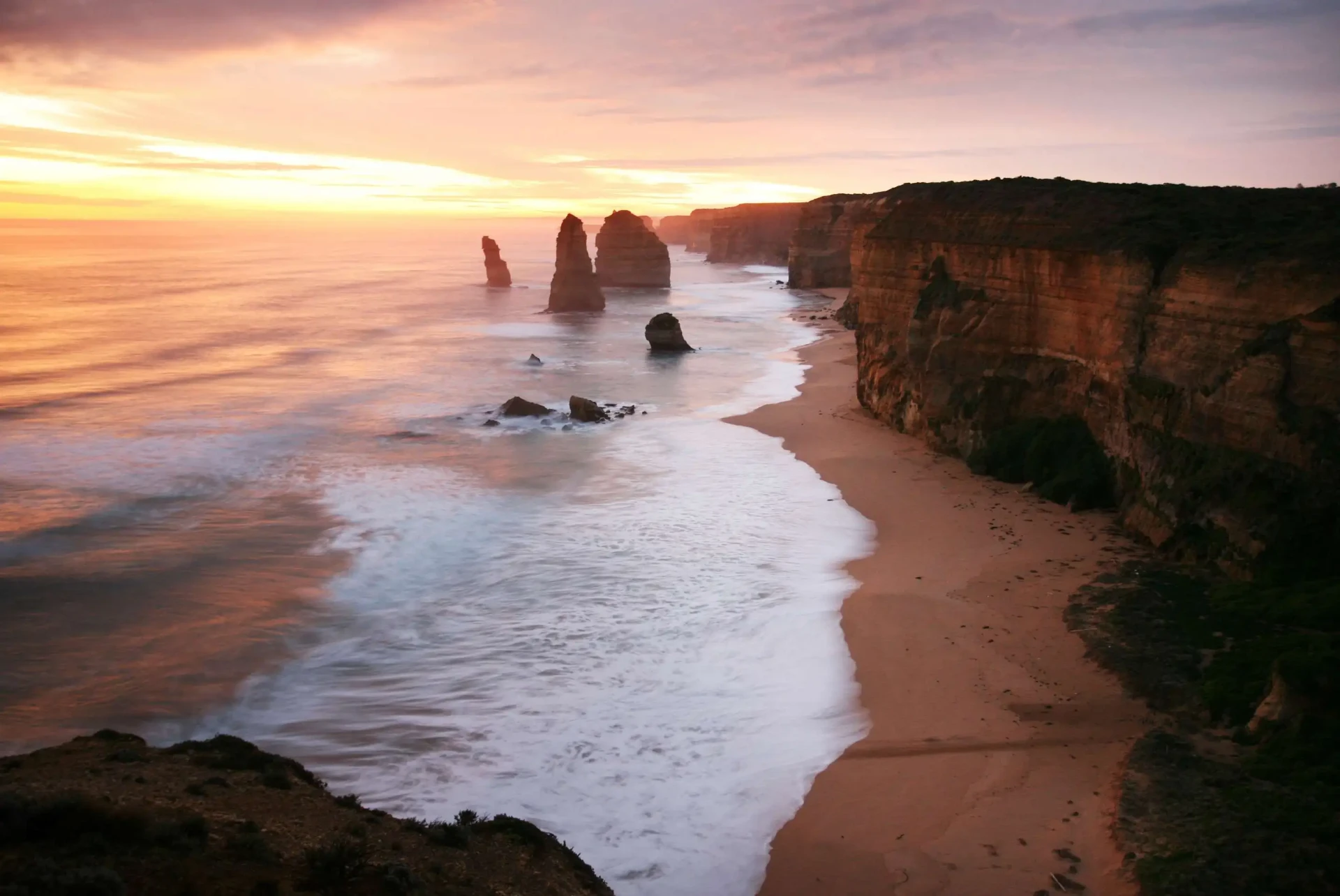 The Twelve Apostles limestone stacks at sunset on the Great Ocean Road, Victoria