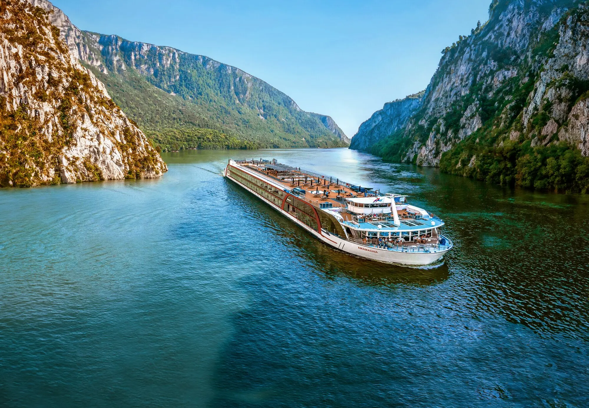 AmaWaterways' AmaMagna sailing through the Iron Gates gorge on the Danube