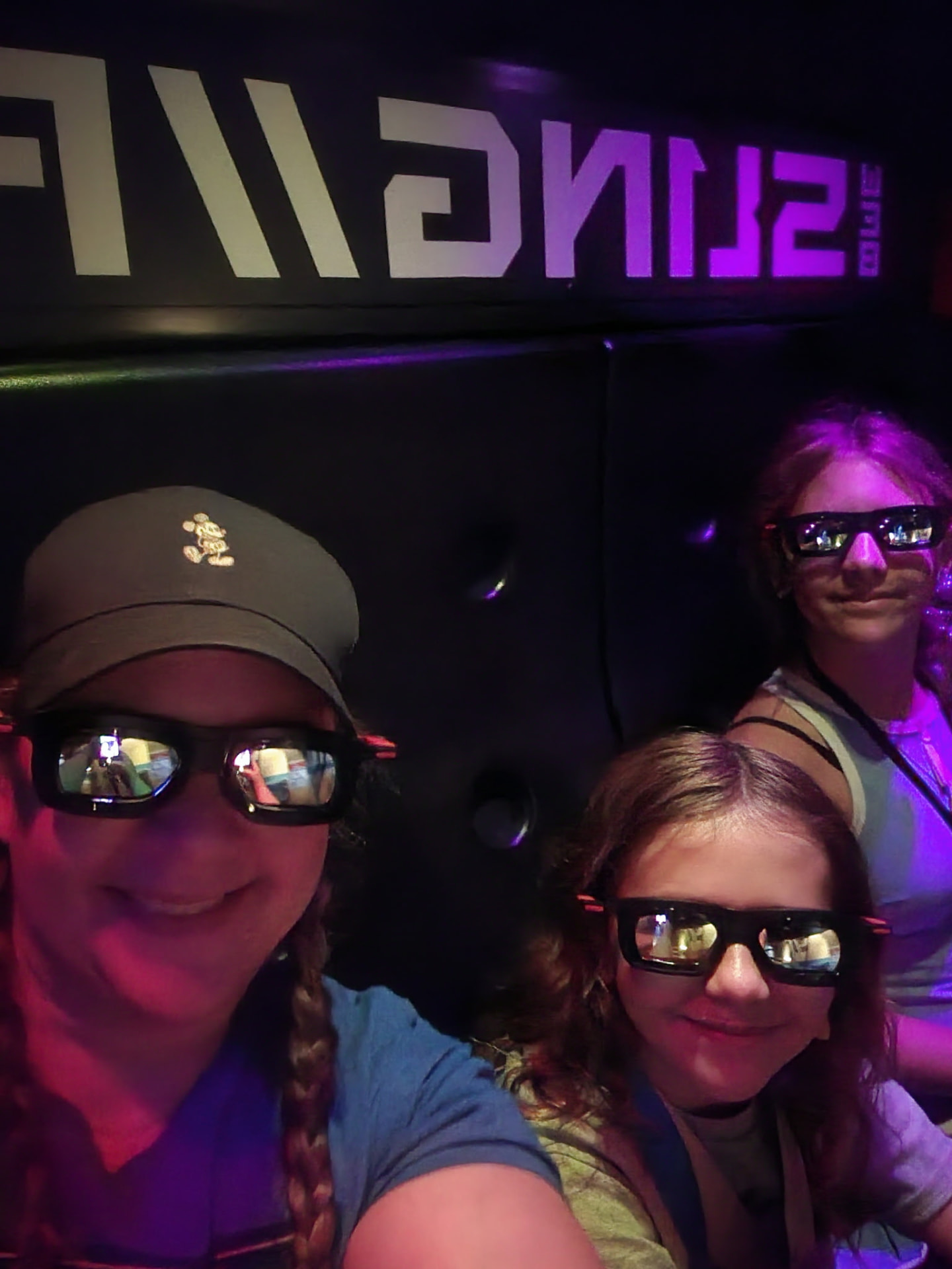 Kim Koldykowski and her daughters in 3D glasses at Walt Disney World